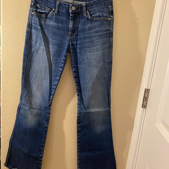 7 for all mankind boot cut flare jeans. Size 27. Medium wash. Faded front. - Picture 3 of 16